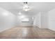 Large living room with tile floors and kitchen bar at 2348 Isle Royale Se Ct, Winter Haven, FL 33880