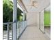 Covered balcony with tile floor and view at 2348 Isle Royale Se Ct, Winter Haven, FL 33880