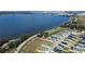 Community overview showing houses near a lake at 252 Walkers Point Dr, Auburndale, FL 33823