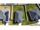 Three houses with gray roofs and solar panels, viewed from above at 252 Walkers Point Dr, Auburndale, FL 33823