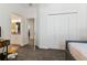 Bedroom with a view of the bathroom and additional closet space at 252 Walkers Point Dr, Auburndale, FL 33823