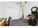 Bedroom with a desk, chair, and built-in closet at 252 Walkers Point Dr, Auburndale, FL 33823