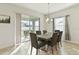 Dining room with sliding doors that open onto the patio at 252 Walkers Point Dr, Auburndale, FL 33823