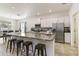 Modern kitchen with stainless steel appliances and granite countertops at 252 Walkers Point Dr, Auburndale, FL 33823