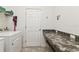 Laundry room with washer, dryer, and built-in counter space at 252 Walkers Point Dr, Auburndale, FL 33823