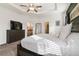 Spacious main bedroom with large bed, dresser, and ensuite bathroom access at 252 Walkers Point Dr, Auburndale, FL 33823