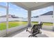 Relaxing screened porch overlooking backyard at 252 Walkers Point Dr, Auburndale, FL 33823
