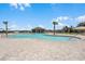 Community pool with a pavilion and lounge chairs at 2591 Red Egret Dr, Bartow, FL 33830