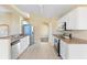 Modern kitchen featuring stainless steel appliances and white cabinets at 2752 Rochelle Dr, Winter Haven, FL 33881