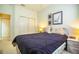 Bedroom with double closet and a comfortable bed at 4128 Aberdeen Ln, Lake Wales, FL 33859