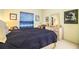 Bedroom with double closet and a comfortable bed at 4128 Aberdeen Ln, Lake Wales, FL 33859