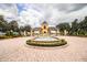 Lake Ashton community entrance with fountain and gatehouse at 4128 Aberdeen Ln, Lake Wales, FL 33859