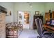 Home office features built-in desk, comfortable seating, and view to kitchen at 4128 Aberdeen Ln, Lake Wales, FL 33859