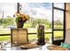 Enjoy the view from this screened patio, complete with table and chairs at 4128 Aberdeen Ln, Lake Wales, FL 33859