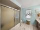 Bathroom with shower, tub, and tiled floor at 4128 Mather W Rd, Lakeland, FL 33810