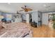 Large bedroom with ensuite bathroom and hardwood floors at 4128 Mather W Rd, Lakeland, FL 33810