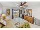 Bedroom with a bed, dresser, and view of the street at 4128 Mather W Rd, Lakeland, FL 33810