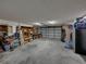2-car garage with shelving, workbench and ample storage at 4128 Mather W Rd, Lakeland, FL 33810