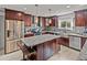 Modern kitchen with stainless steel appliances and granite countertops at 4128 Mather W Rd, Lakeland, FL 33810