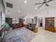 Open concept living room with hardwood floors and access to kitchen at 4128 Mather W Rd, Lakeland, FL 33810