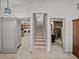 View of the staircase leading upstairs from the main floor at 4128 Mather W Rd, Lakeland, FL 33810