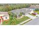 A well-kept property featuring lush landscaping, and a driveway with space for multiple cars at 4145 Whistlewood Cir, Lakeland, FL 33811
