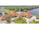 A beautiful community with a pool, clubhouse, and lush landscaping, providing a resort-style living experience at 4145 Whistlewood Cir, Lakeland, FL 33811