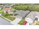 Aerial view of an attractive home featuring lush landscaping, and a long driveway at 4145 Whistlewood Cir, Lakeland, FL 33811