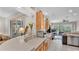 Bright kitchen featuring quartz countertops, light wood cabinets, and an open layout at 4145 Whistlewood Cir, Lakeland, FL 33811