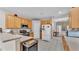 Spacious kitchen featuring stainless steel appliances, ample cabinetry and tile flooring at 4145 Whistlewood Cir, Lakeland, FL 33811