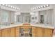 This is the main bathroom featuring a make up counter, and sinks and plenty of storage at 4145 Whistlewood Cir, Lakeland, FL 33811