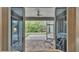 Screened patio features brick pavers and ceiling fan, offering a seamless transition to outdoor living at 4145 Whistlewood Cir, Lakeland, FL 33811