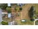 Aerial view showing the layout of the house and its well maintained, partially fenced yard at 4380 Turner Rd, Mulberry, FL 33860