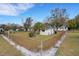 Spacious backyard featuring a storage shed and full fencing at 4380 Turner Rd, Mulberry, FL 33860