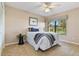 Cozy bedroom featuring a single bed, window, and ceiling fan at 4419 Burlington Dr, Winter Haven, FL 33880