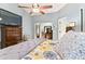 Main bedroom with dresser and access to bathroom at 4419 Burlington Dr, Winter Haven, FL 33880