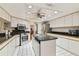 Modern kitchen with granite countertops and stainless steel appliances at 4419 Burlington Dr, Winter Haven, FL 33880