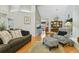 Spacious living room with hardwood floors and cozy seating at 4419 Burlington Dr, Winter Haven, FL 33880
