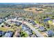 Aerial view of a house and neighborhood, showing a desirable location and community at 4434 Micanope Crescent Dr, Lakeland, FL 33811