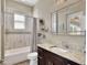 Bathroom with tub, shower, and a single vanity at 4434 Micanope Crescent Dr, Lakeland, FL 33811