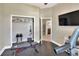 Home gym with various weight equipment and storage at 4434 Micanope Crescent Dr, Lakeland, FL 33811