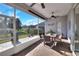 Screened porch with seating area and view of backyard at 4434 Micanope Crescent Dr, Lakeland, FL 33811