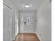 Light-filled entryway with white doors and wood-look floors at 4505 S Laurel Pointe Dr, Lakeland, FL 33813