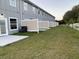 Private backyard with grassy area and privacy fence at 460 N 1St Ave, Bartow, FL 33830
