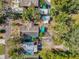 Aerial view of property showcasing lush landscaping, backyard, and neighborhood at 531 Hunter St, Lakeland, FL 33803