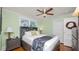 Cozy bedroom featuring a ceiling fan and neutral decor at 531 Hunter St, Lakeland, FL 33803