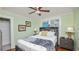 Comfortable bedroom with a ceiling fan and natural light at 531 Hunter St, Lakeland, FL 33803