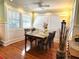 Cozy dining room with hardwood floors, a dining table with chairs, and lots of natural light at 531 Hunter St, Lakeland, FL 33803