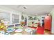 Bright dining room with natural light, an open floor plan, and an adjacent living area at 531 Hunter St, Lakeland, FL 33803