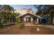 Charming single-story home with a welcoming front porch and professionally landscaped front yard at 531 Hunter St, Lakeland, FL 33803